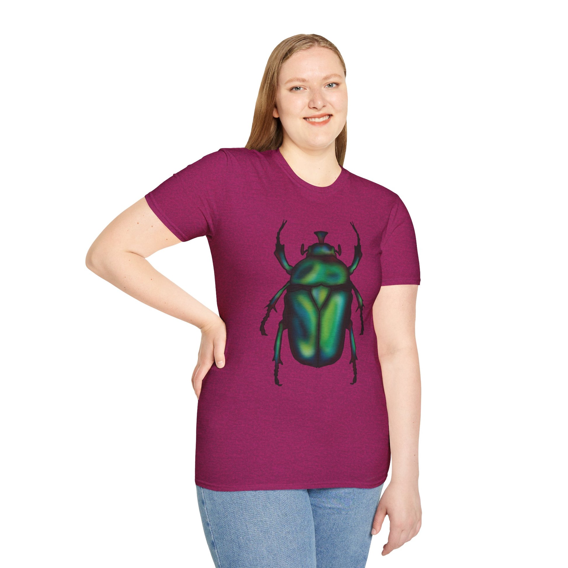 Woman wearing a fuscia t-shirt featuring an illustration of a June bug (green chafer beetle) across the chest.