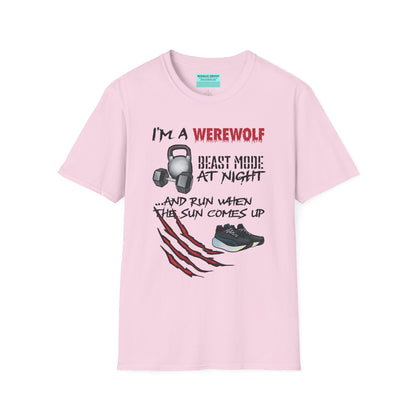 Pink t-shirt featuring illustrations of kettlebells, dumbbells, and running shoes, with the phrase 'I'm a werewolf. Beast mode at night, and run when the sun comes up.'