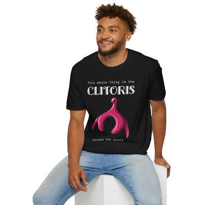 Man wearing a black t-shirt with an illustration of the clitoris and white text that reads 'this whole thing is the clitoris. spread the word’.
