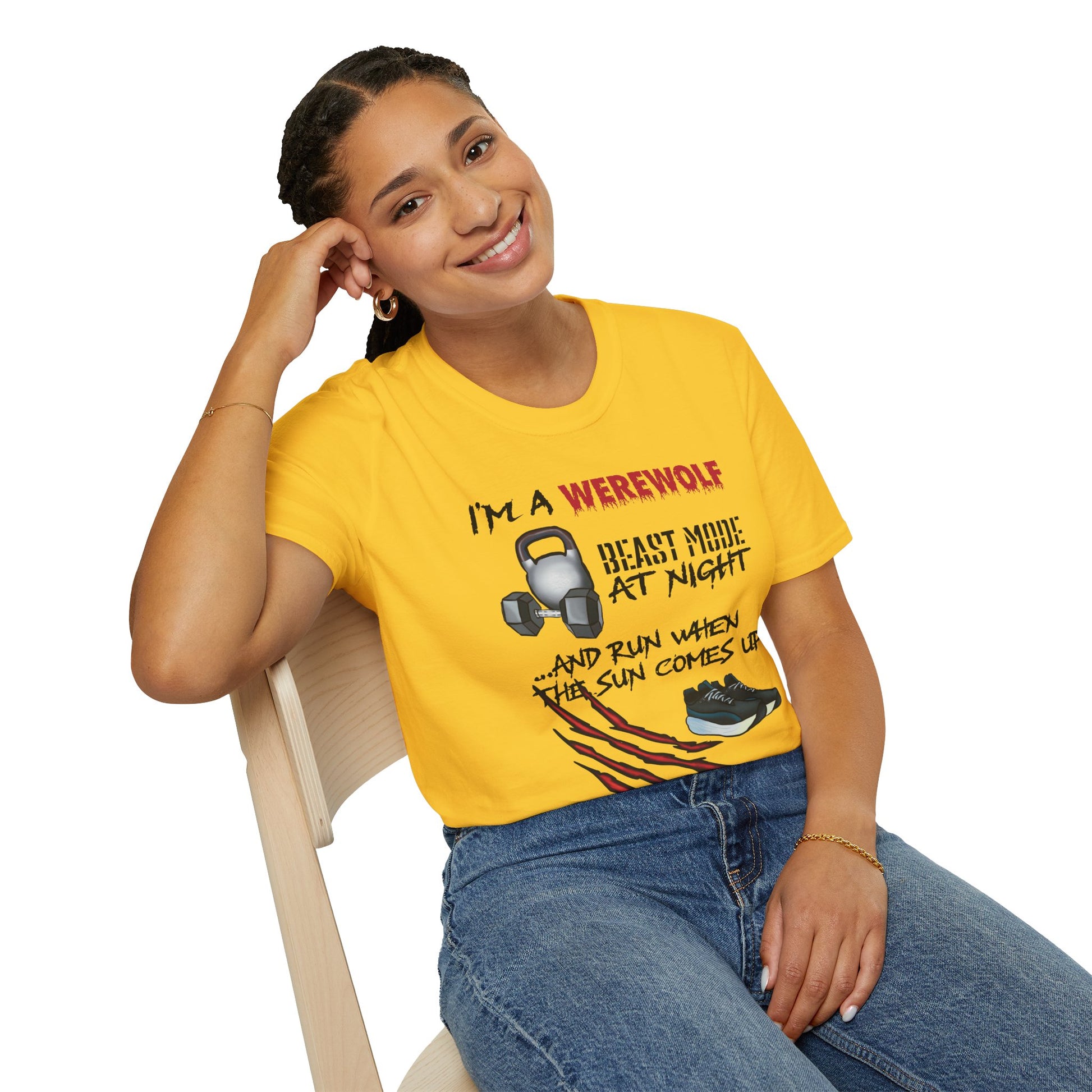 Woman wearing a yellow t-shirt featuring illustrations of kettlebells, dumbbells, and running shoes, with the phrase 'I'm a werewolf. Beast mode at night, and run when the sun comes up.'