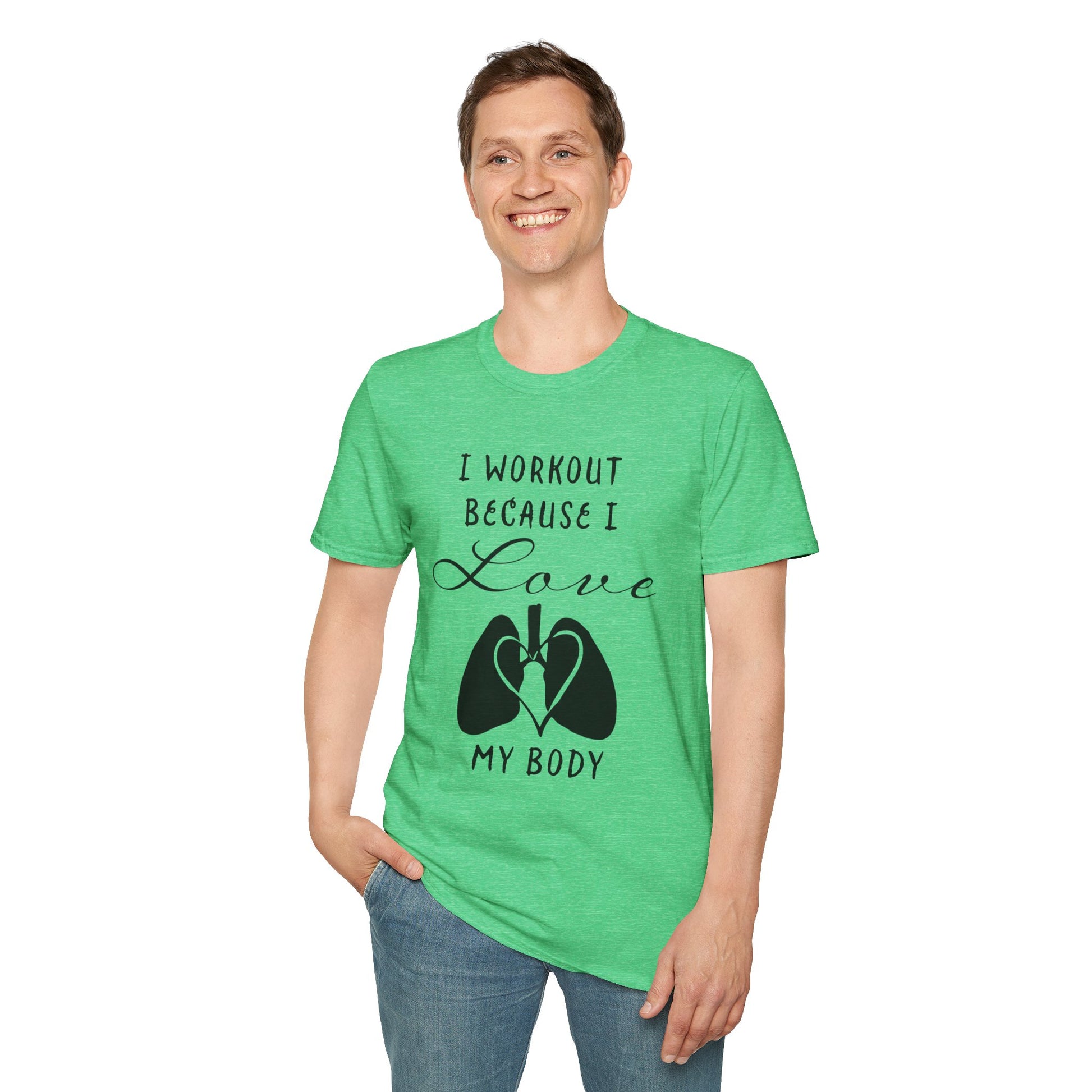 Man wearing a green unisex short sleeve t-shirt with a bold message: "I workout because I love my body," paired with a simple drawing of a heart and lungs—because cardio is more than a vibe, it’s biology.