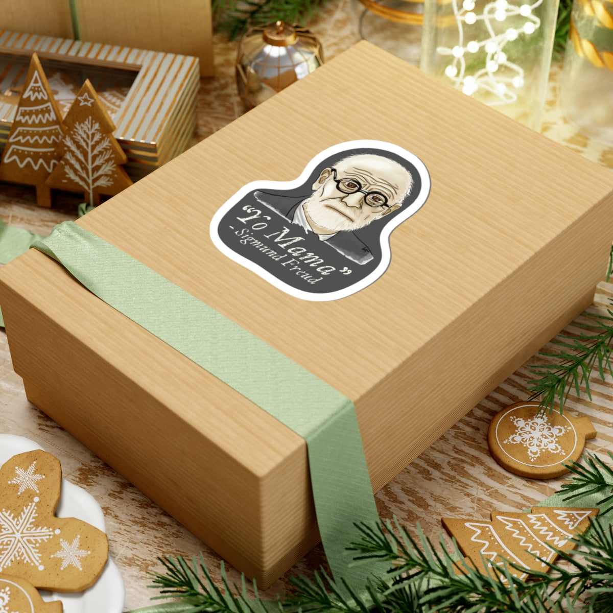 Medium sticker adhered to a gift featuring a portrait of Sigmund Freud with the humorous quote 'yo mama' written below him.