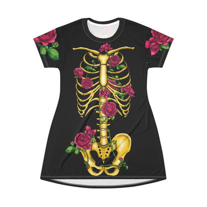 Anterior view of a black t-shirt dress featuring a gold anatomical illustration of the human skeleton on the back, adorned with blooming pink roses interwoven through the bones.