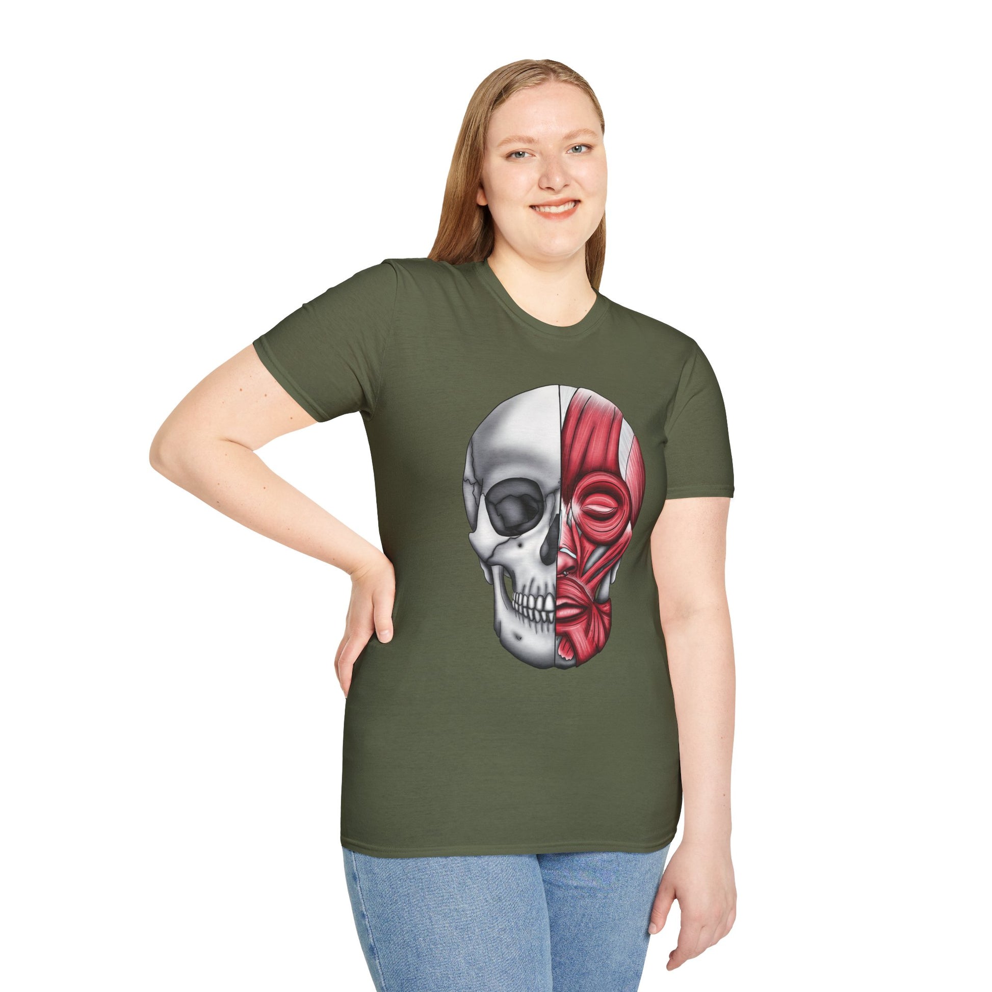 Woman wearing a green shirt featuring an anatomically correct skull illustration, with half of the skull covered by facial muscles.