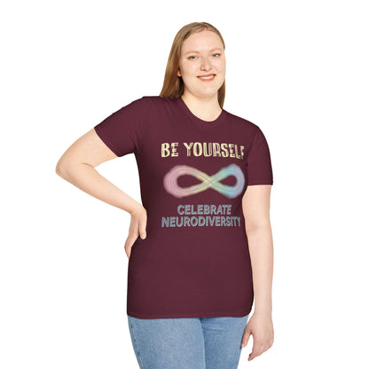 Woman wearing a burgundy t-shirt featuring a pastel-colored rainbow infinity symbol, with the text 'Be yourself, celebrate neurodiversity'.
