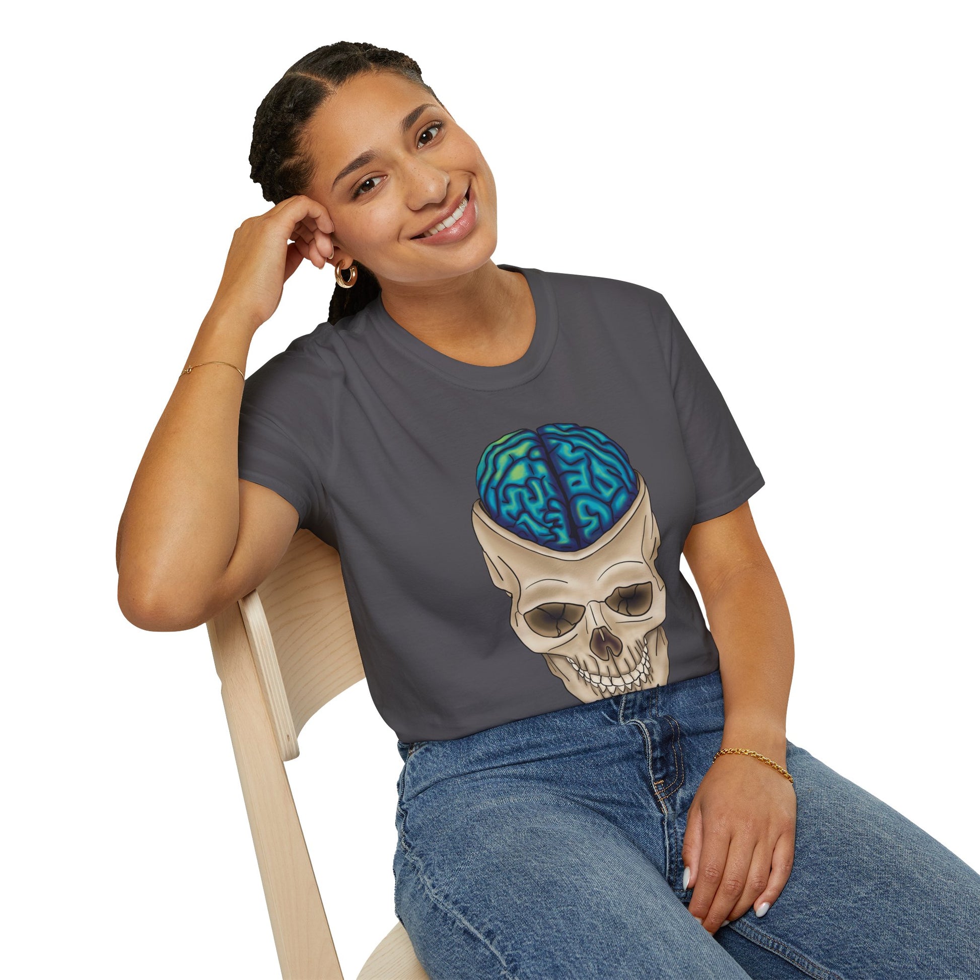 Woman wearing a dark grey t-shirt featuring a drawing of an anatomical skull, with a brain emerging from the top.