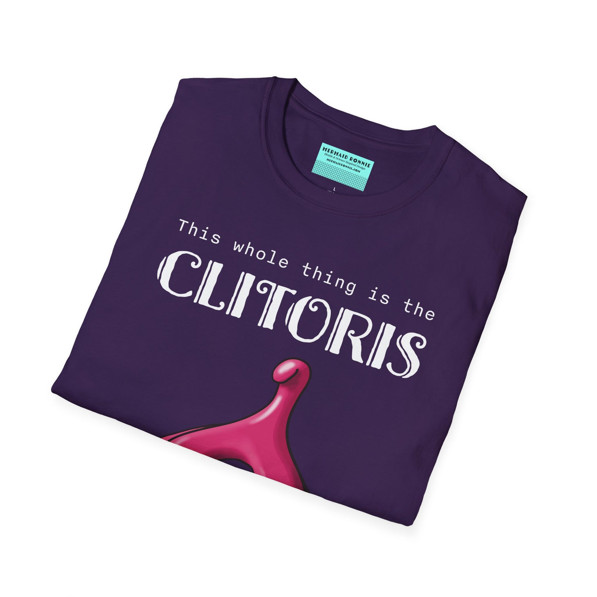 Folded purple t-shirt with an illustration of the clitoris and white text that reads 'this whole thing is the clitoris. spread the word’.