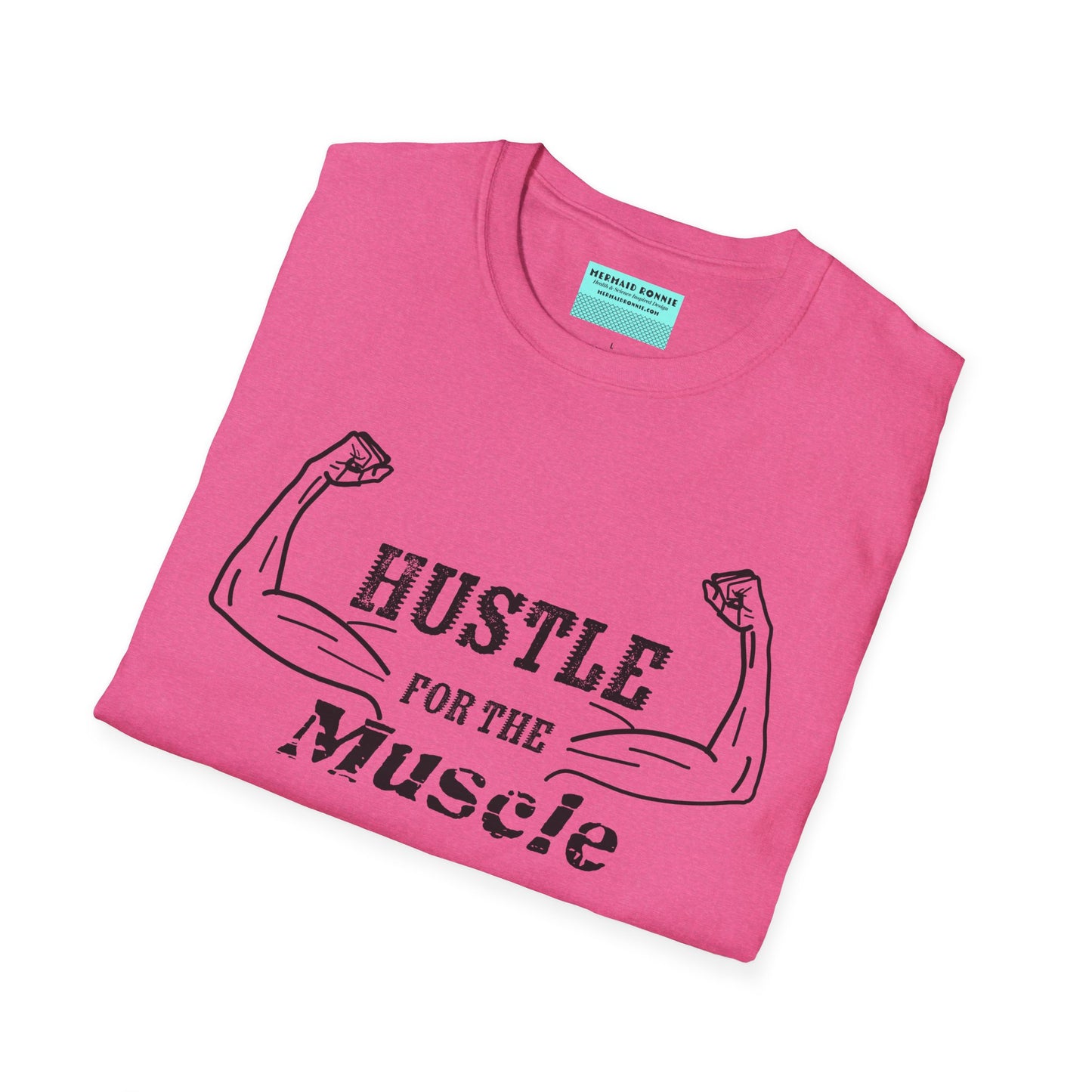 Folded pink unisex short sleeve t-shirt with a bold graphic of strong, flexed feminine arms and the empowering phrase "Hustle for the Muscle"—because strength is stylish and lifting is for everyone.