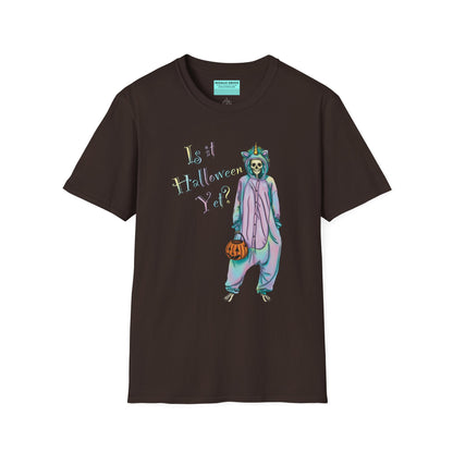 Brown t-shirt featuring a drawing of a skeleton in a unicorn costume onesie, with the phrase 'Is it Halloween yet?' printed on it.