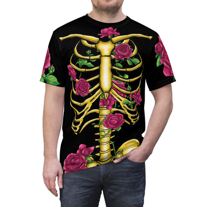 Front view of a man wearing a unisex black athletic t-shirt featuring a gold anatomical skeleton adorned with blooming pink roses—because strength and beauty aren't mutually exclusive, and your bones deserve to blossom.