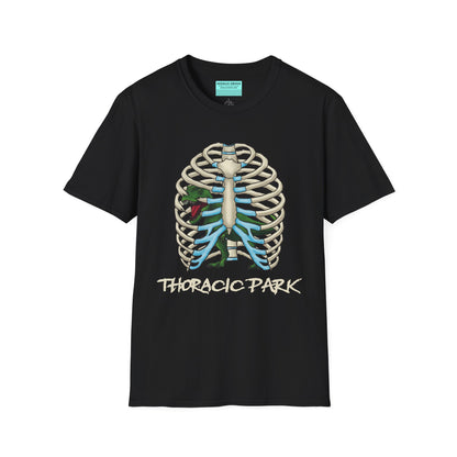 Black unisex short sleeve tee with a clever Jurassic twist—an anatomical rib cage doubles as a prehistoric prison for a tiny T-Rex, with the punny caption "Thoracic Park" below. It's dino-mite meets anatomy class in the best way possible.