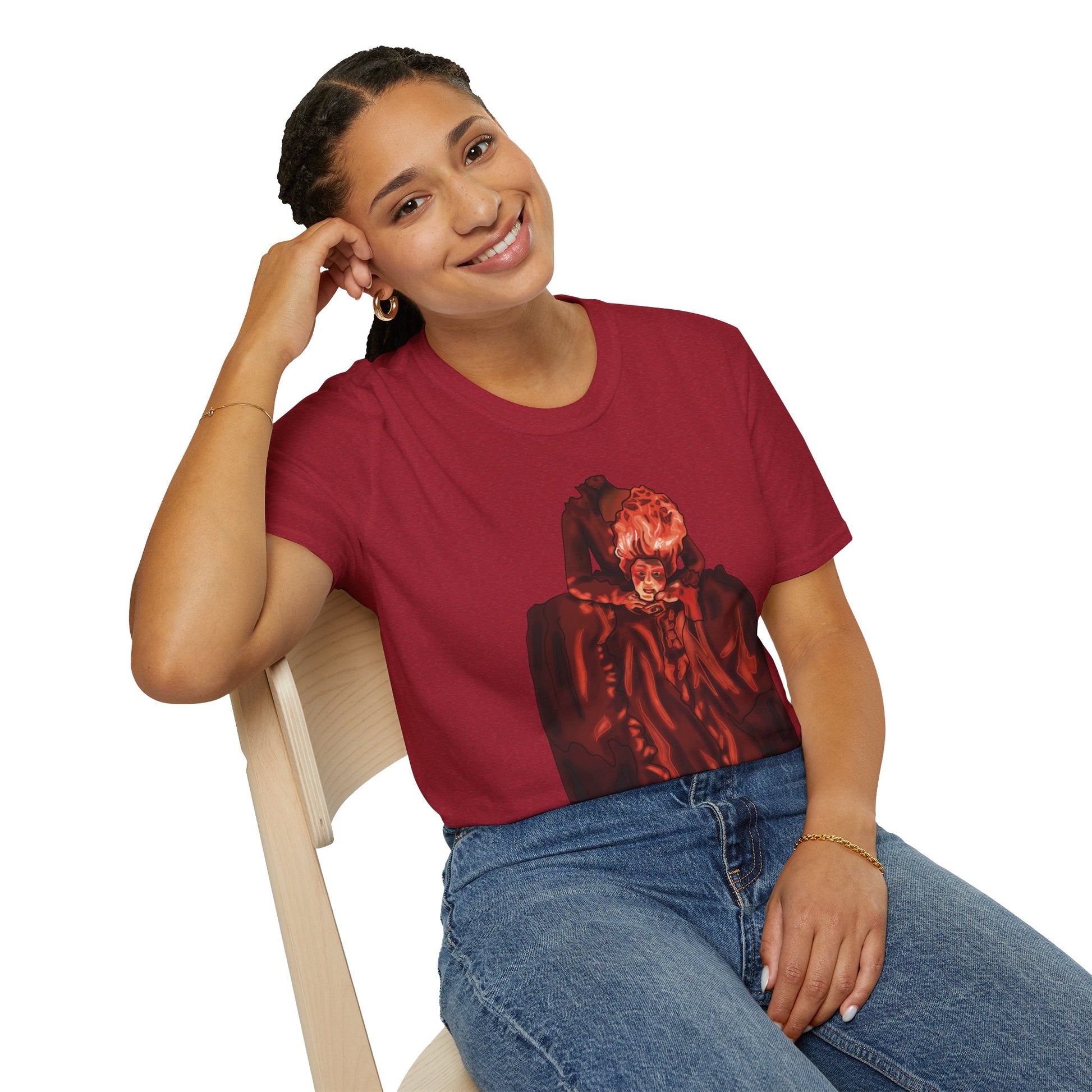 Woman wearing a red t-shirt featuring an illustration of a headless Marie Antoinette holding her own head in her hands.
