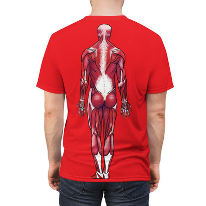 Man wearing a red athletic t-shirt featuring a detailed posterior view diagram of the human muscular system printed on the back.