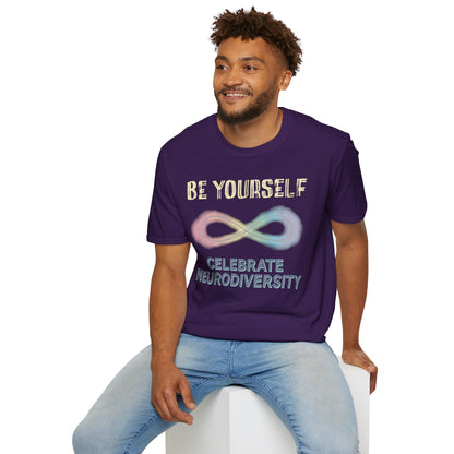 Man wearing a dark purple t-shirt featuring a pastel-colored rainbow infinity symbol, with the text 'Be yourself, celebrate neurodiversity'.