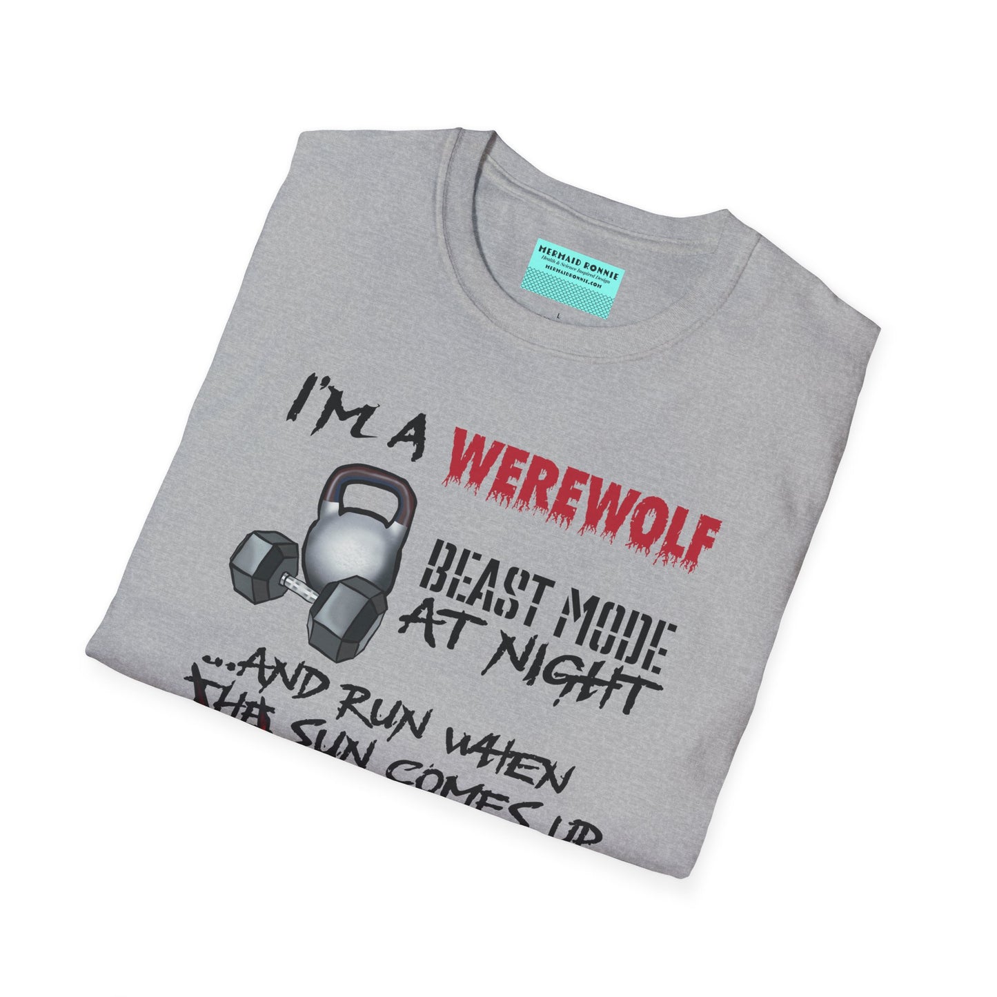 Folded grey t-shirt featuring illustrations of kettlebells, dumbbells, and running shoes, with the phrase 'I'm a werewolf. Beast mode at night, and run when the sun comes up.'