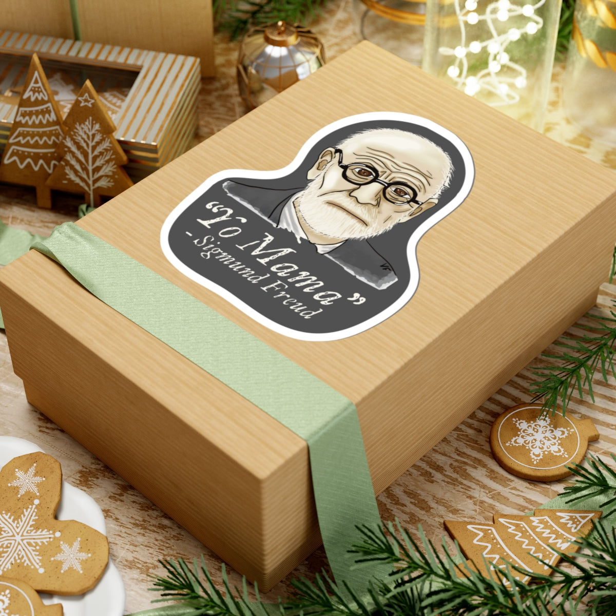 Large sticker adhered to a gift featuring a portrait of Sigmund Freud with the humorous quote 'yo mama' written below him.