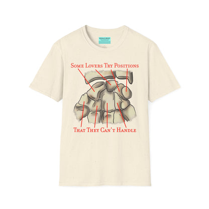 Beige t-shirt featuring an anatomical drawing of the carpal bones, with the mnemonic 'Some lovers try positions that they can't handle' displayed.