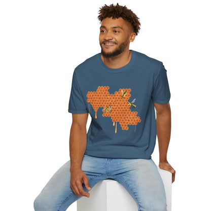 Man wearing a blue shirt featuring a picture of honeybees buzzing around a large piece of honeycomb with honey dripping down from it.