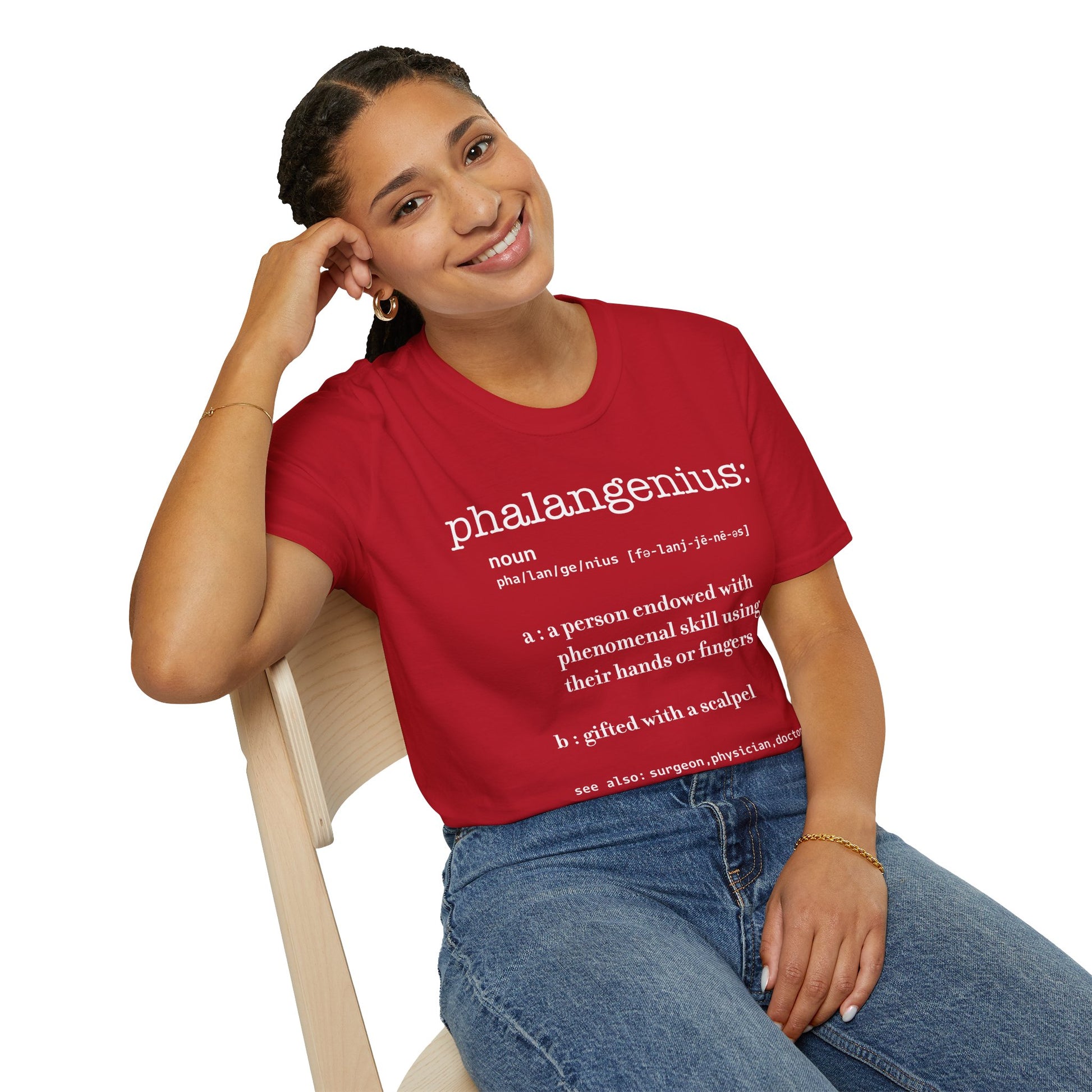Woman wearing a red t-shirt featuring a dictionary-style definition of the term 'Phalangenius,' a humorous play on the terms 'phalange' and 'genius,' aimed at surgeons.