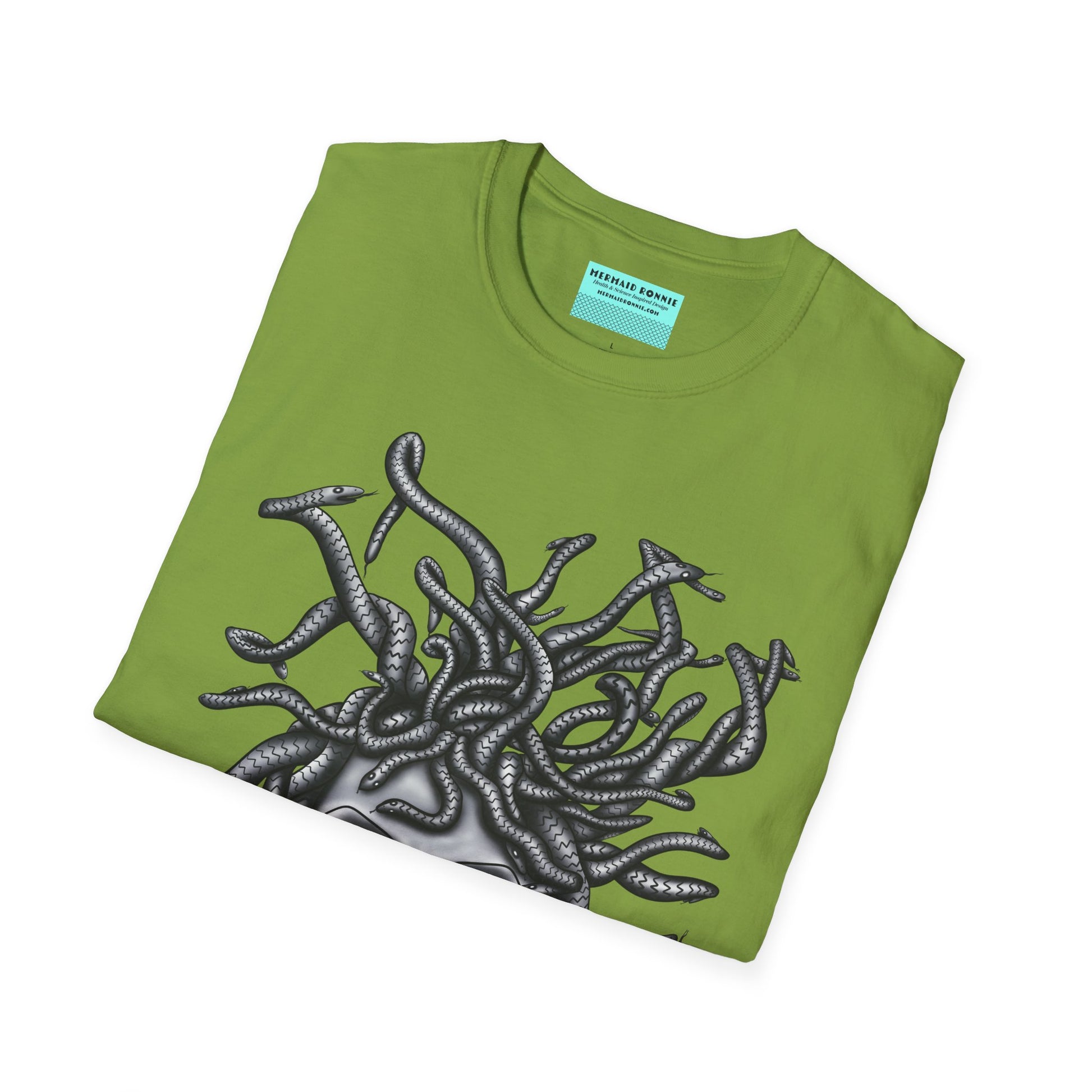 Folded green t-shirt featuring a grayscale drawing of Medusa.