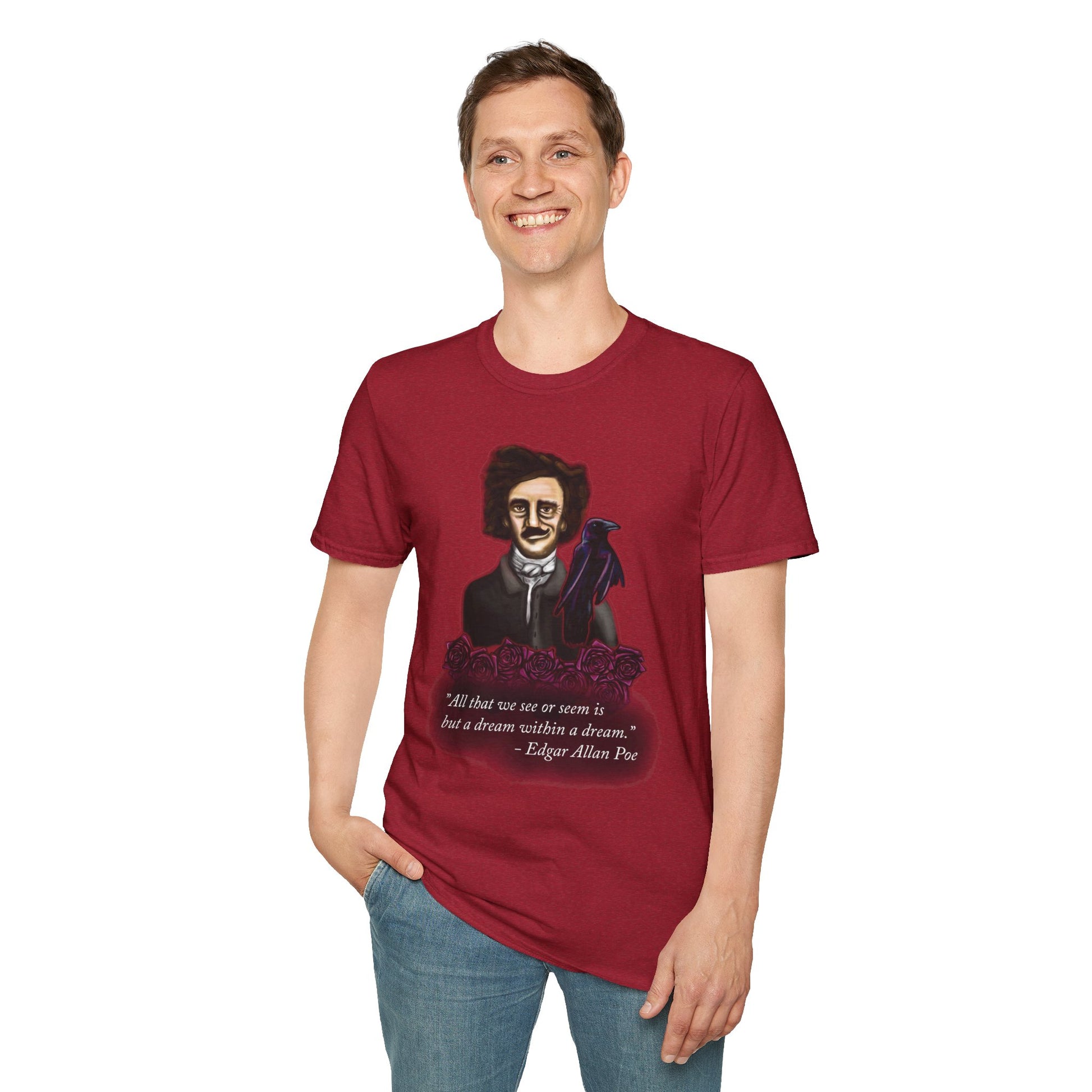 Man wearing a red t-shirt featuring a drawing of Edgar Allan Poe with a raven perched nearby and red roses surrounding them, along with the quote 'All that we see or seem is but a dream within a dream.'