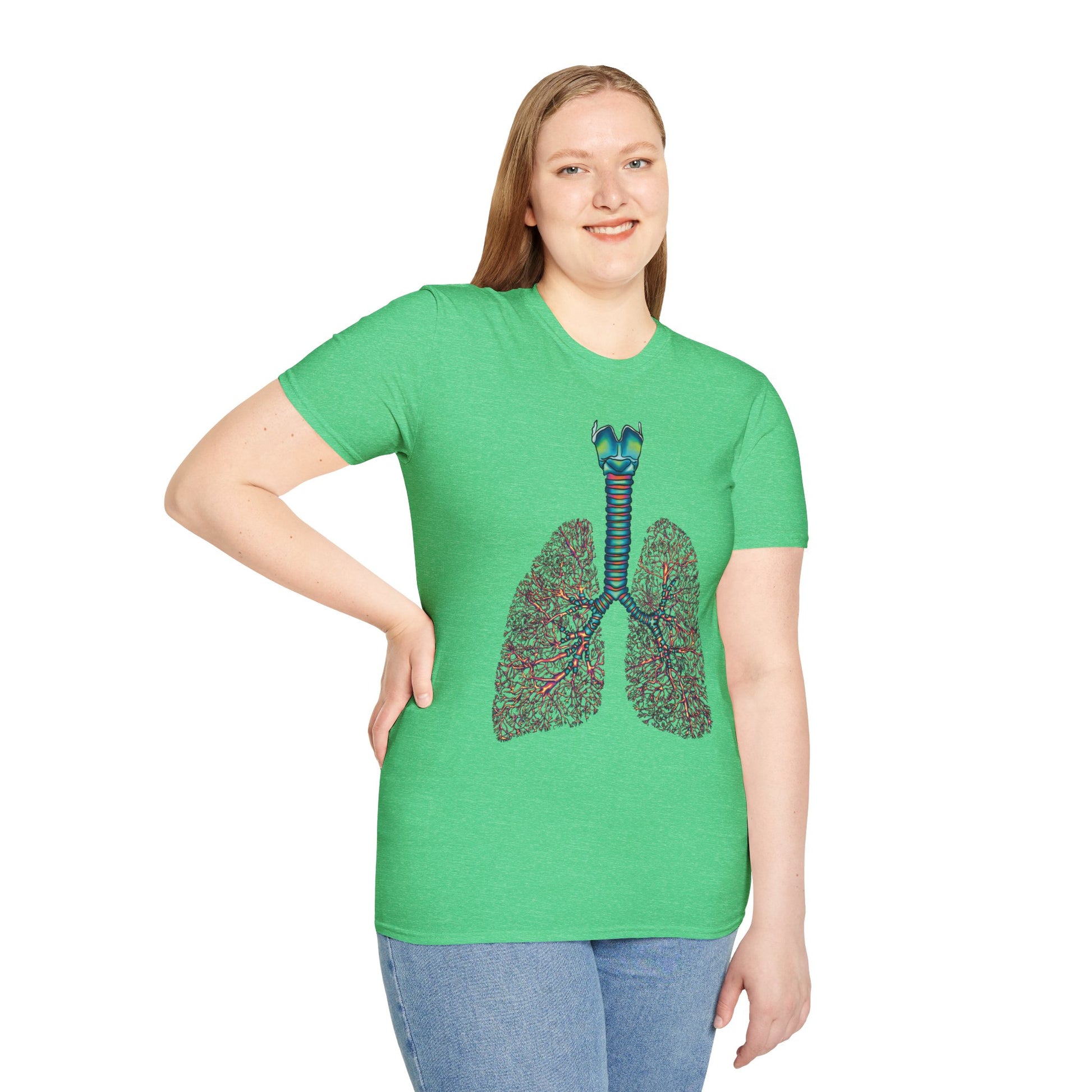 Woman wearing a green t-shirt featuring an illustration of anatomical lungs, including the bronchi, trachea, and larynx.