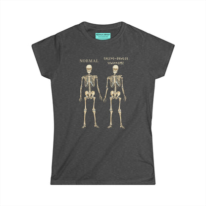 Women’s t-shirt in grey with two skeletons side by side. The first is labeled 'Normal' and the second is labeled 'Ehlers-Danlos Syndrome,' visually illustrating the skeletal effects of EDS.