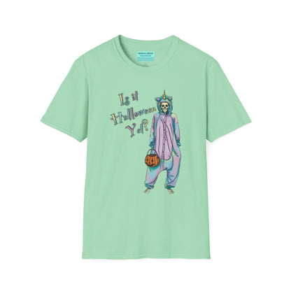 Mint green t-shirt featuring a drawing of a skeleton in a unicorn costume onesie, with the phrase 'Is it Halloween yet?' printed on it.