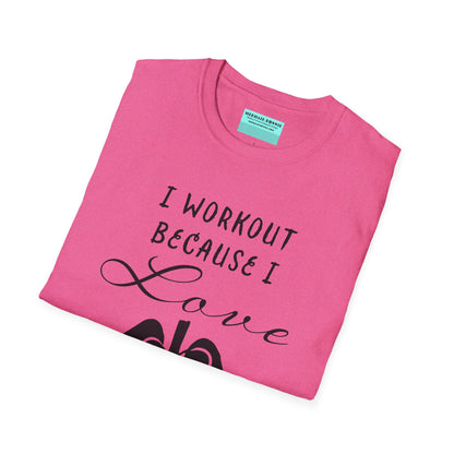 Folded pink unisex short sleeve t-shirt with a bold message: "I workout because I love my body," paired with a simple drawing of a heart and lungs—because cardio is more than a vibe, it’s biology.