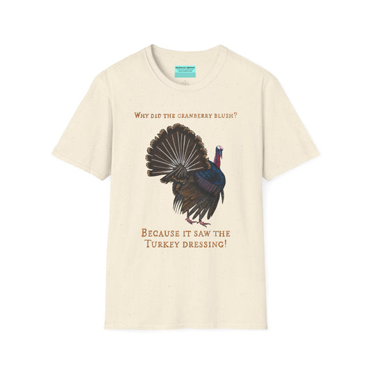 Beige Thanksgiving t-shirt featuring a picture of a turkey and the text 'Why did the cranberry blush? Because it saw the turkey dressing!