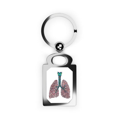 Rectangular silver frame keychain featuring a detailed anatomical drawing of lungs, including the bronchial tree, trachea, and larynx, set against a white background.
