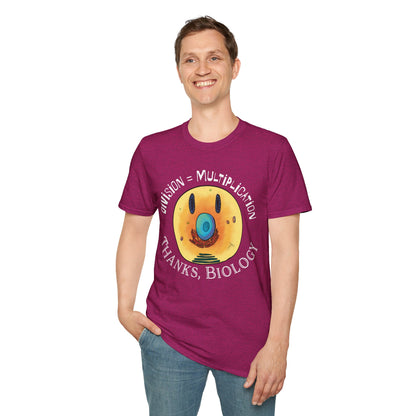 Man wearing a pink t-shirt featuring an illustration of a cell, with cellular organelles arranged to create a smiley face. The text 'Division = Multiplication. Thanks, Biology' is displayed surrounding the image.