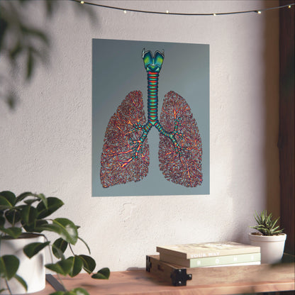 Large poster displayed on a wall in a home setting, featuring an illustration of anatomical lungs with detailed bronchial tree, trachea, and larynx, set against a blue-grey background.