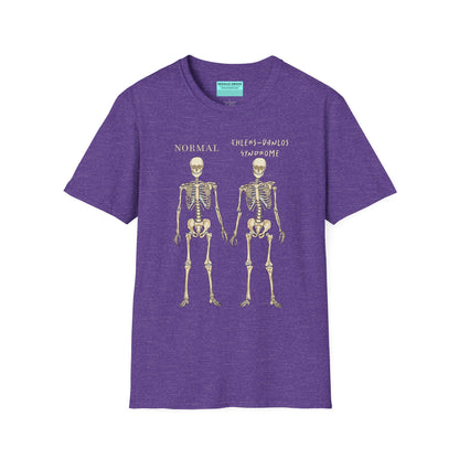 Purple unisex short sleeve t-shirt featuring two skeletons side by side—one labeled "normal," the other "Ehlers-Danlos Syndrome"—because connective tissue disorders deserve more visibility (and maybe a sense of humor, too).