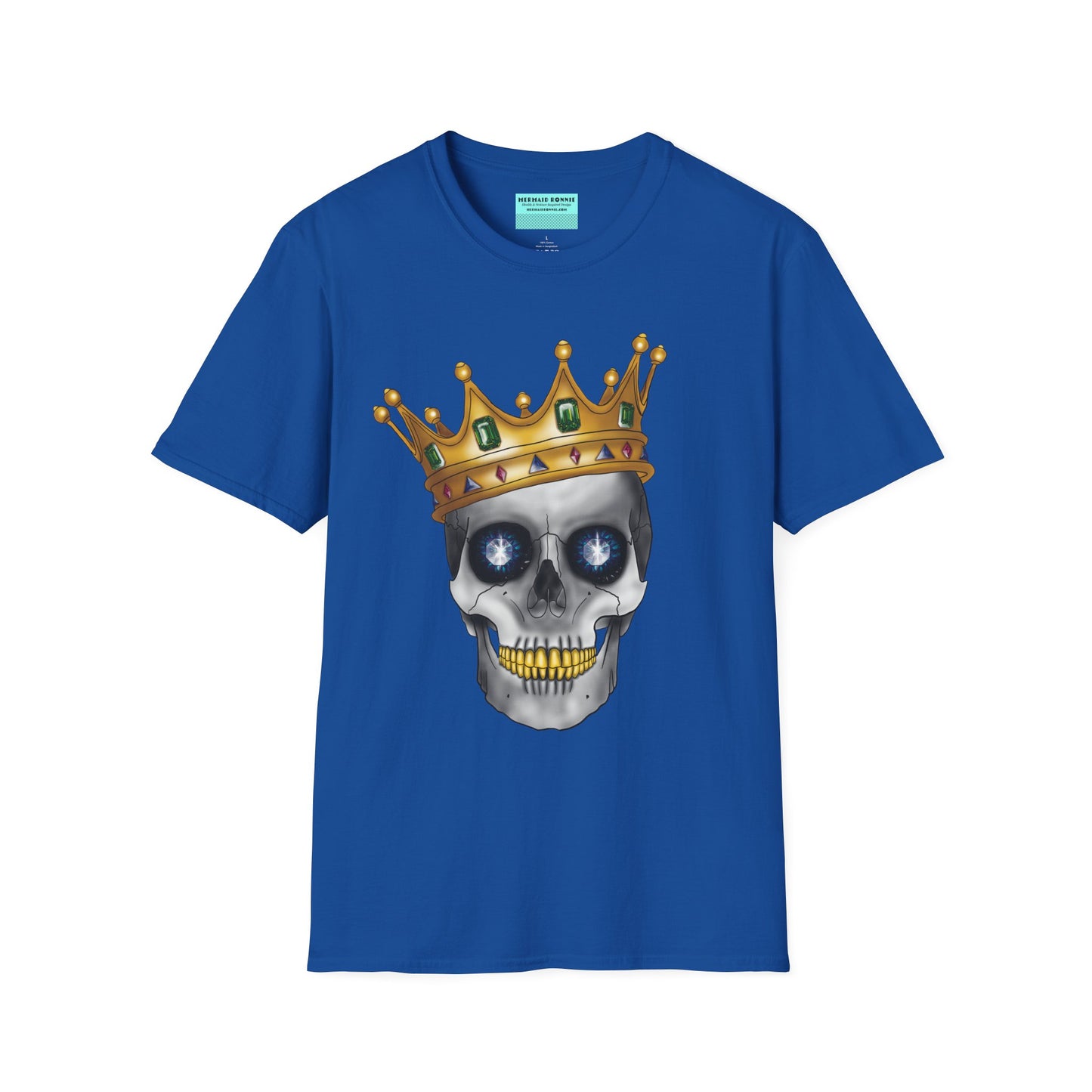 Royal blue t-shirt featuring an anatomical skull wearing an ornate crown, with gold teeth, large sapphire gemstones in the eye sockets, and emeralds and rubies decorating the crown.