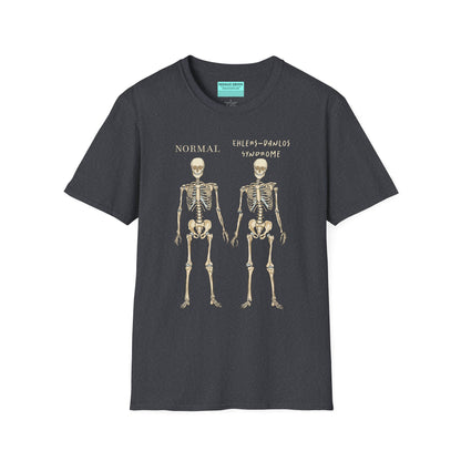 Dark grey unisex short sleeve t-shirt featuring two skeletons side by side—one labeled "normal," the other "Ehlers-Danlos Syndrome"—because connective tissue disorders deserve more visibility (and maybe a sense of humor, too).