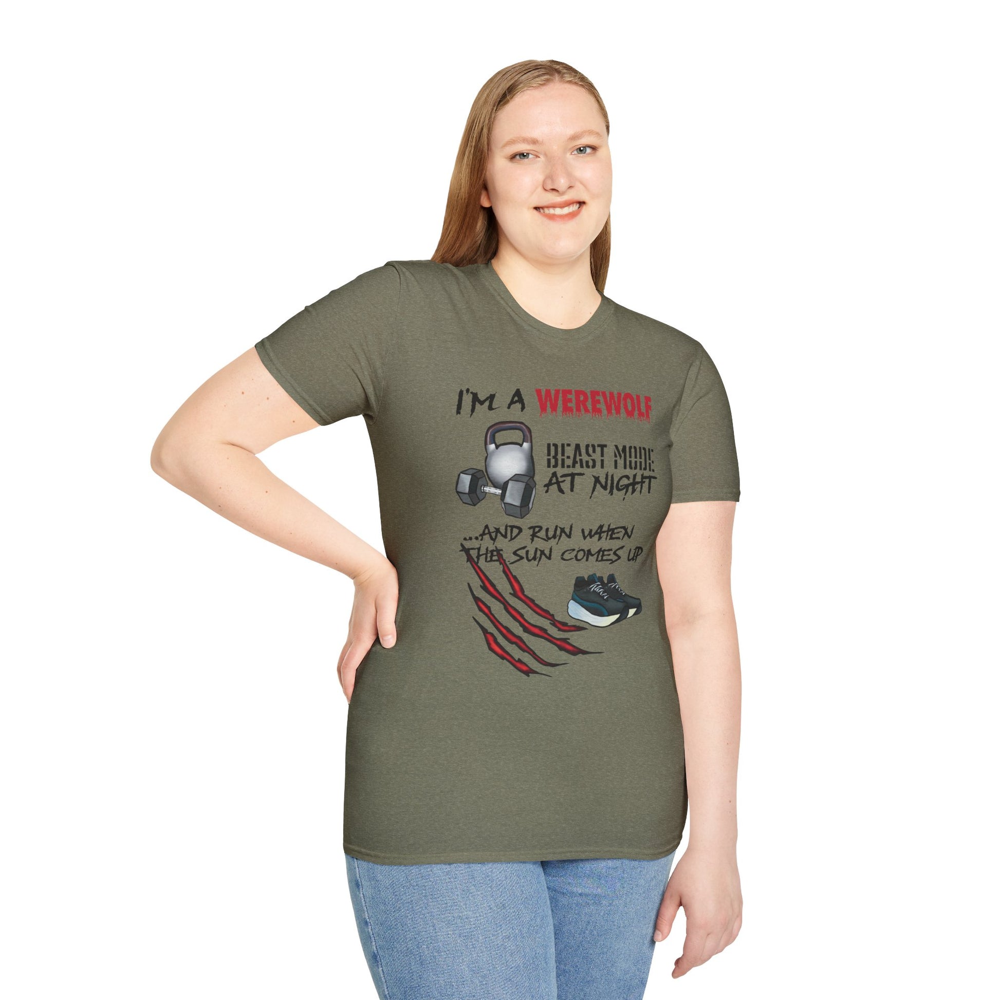 Woman wearing a green t-shirt featuring illustrations of kettlebells, dumbbells, and running shoes, with the phrase 'I'm a werewolf. Beast mode at night, and run when the sun comes up.'