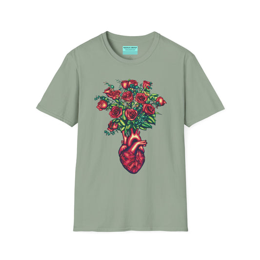 Green shirt featuring an illustration of an anatomical heart used as a vase, with a bouquet of roses emerging from it.