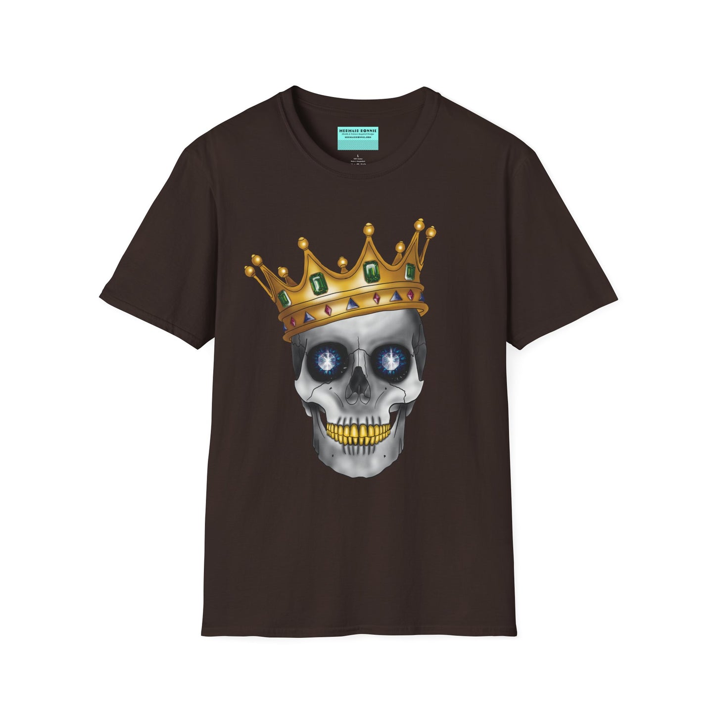 Brown t-shirt featuring an anatomical skull wearing an ornate crown, with gold teeth, large sapphire gemstones in the eye sockets, and emeralds and rubies decorating the crown.