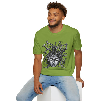 Man wearing a green t-shirt featuring a grayscale drawing of Medusa.