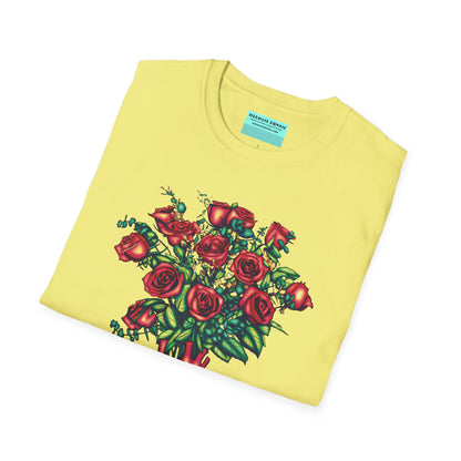 Folded yellow shirt featuring an illustration of an anatomical heart used as a vase, with a bouquet of roses emerging from it.