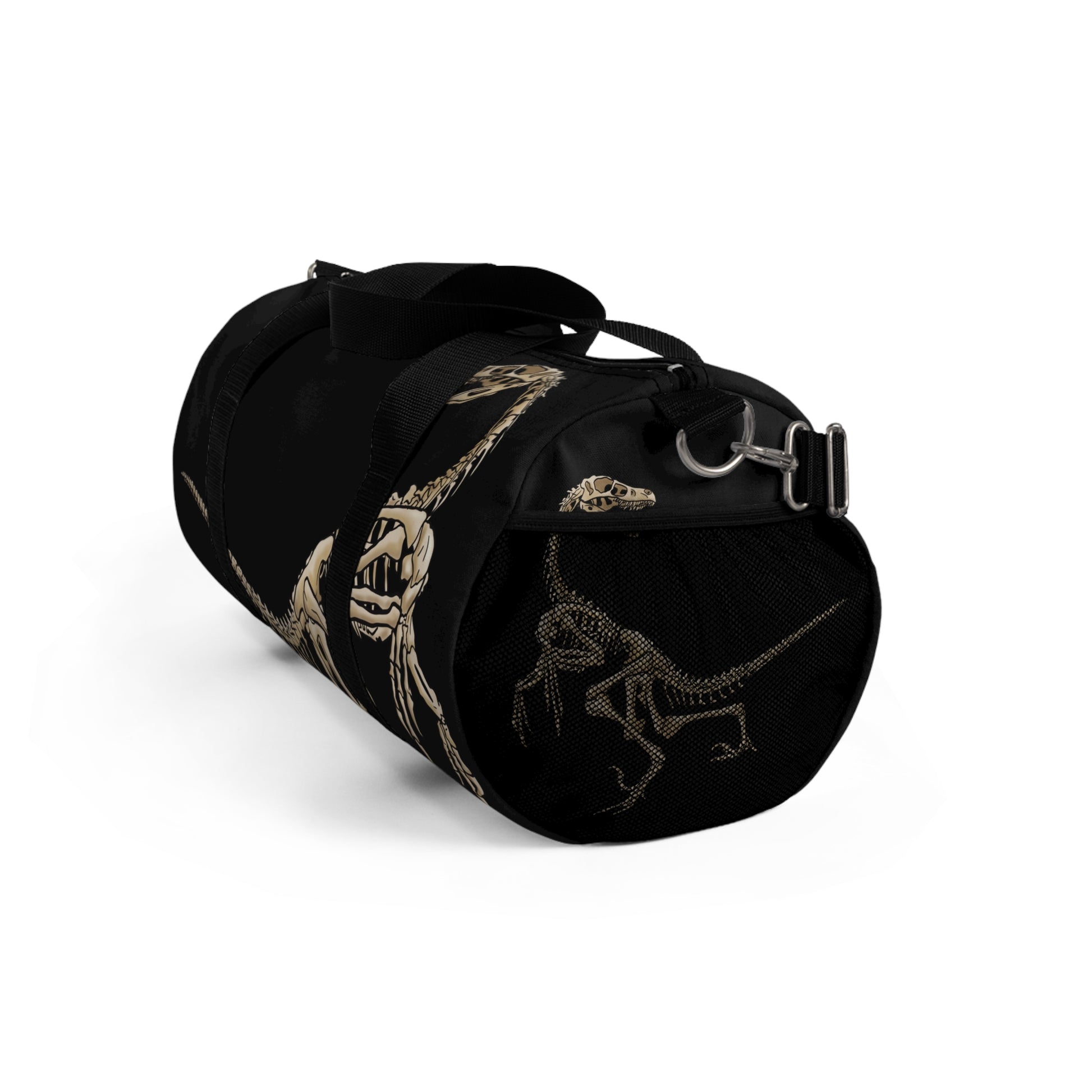 Right side view of a black duffel bag with bone-beige illustrations of velociraptor skeleton fossils—perfect for carrying your gear while channeling serious prehistoric predator energy.