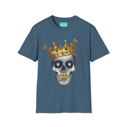 Indigo blue t-shirt featuring an anatomical skull wearing an ornate crown, with gold teeth, large sapphire gemstones in the eye sockets, and emeralds and rubies decorating the crown.