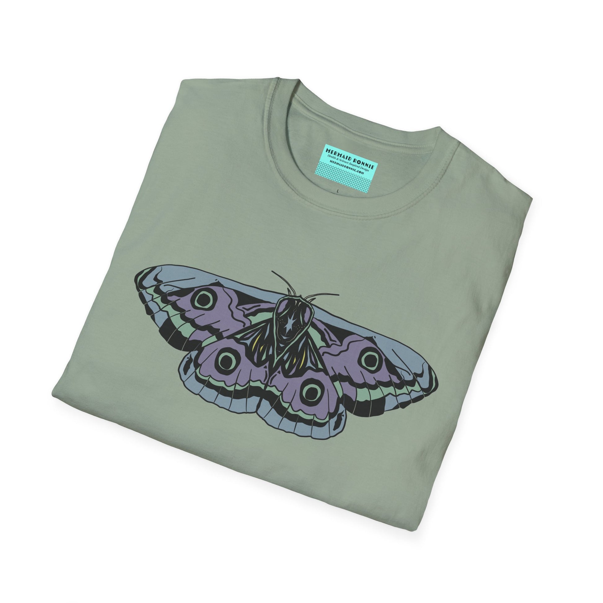 Folded sage green t-shirt featuring a drawing of a blue and purple moth.