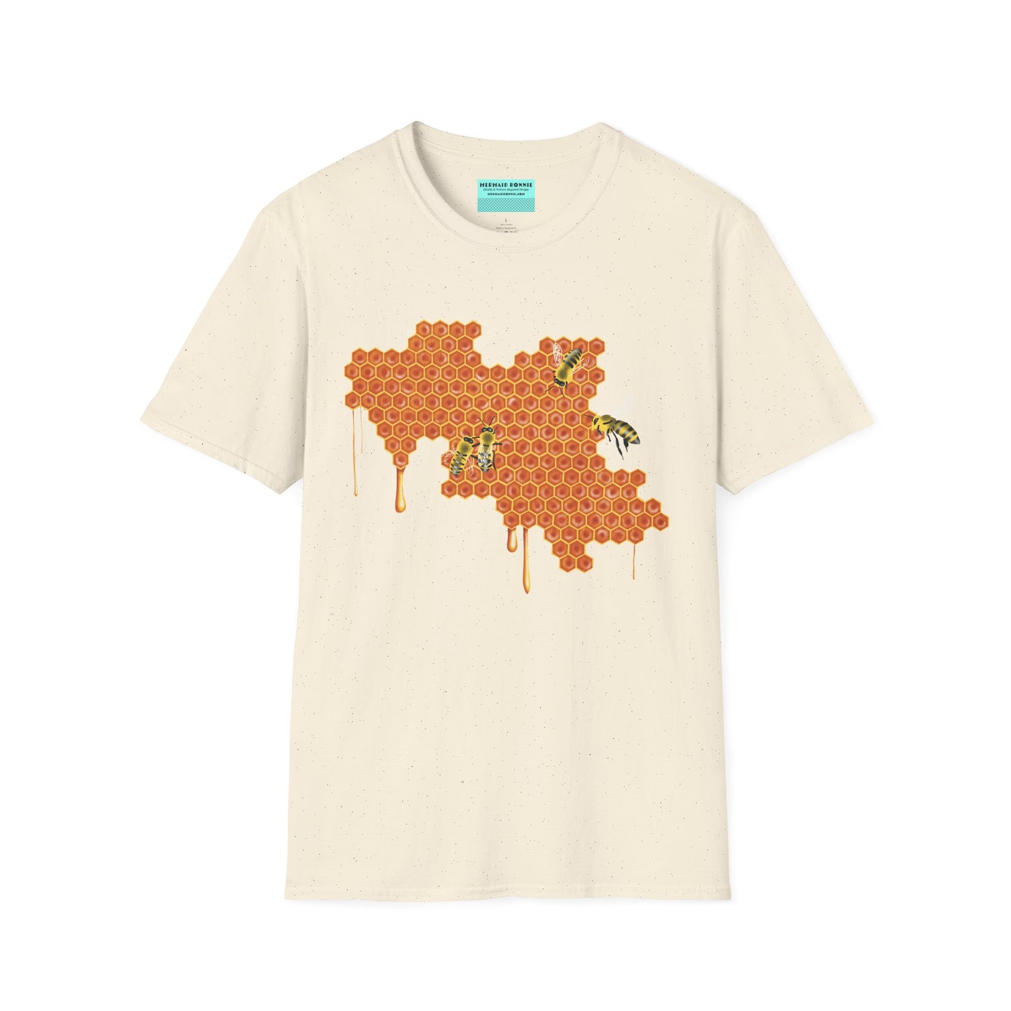 Beige t-shirt featuring a picture of honeybees buzzing around a large piece of honeycomb with honey dripping down from it.