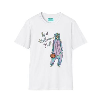 White t-shirt featuring a drawing of a skeleton in a unicorn costume onesie, with the phrase 'Is it Halloween yet?' printed on it.