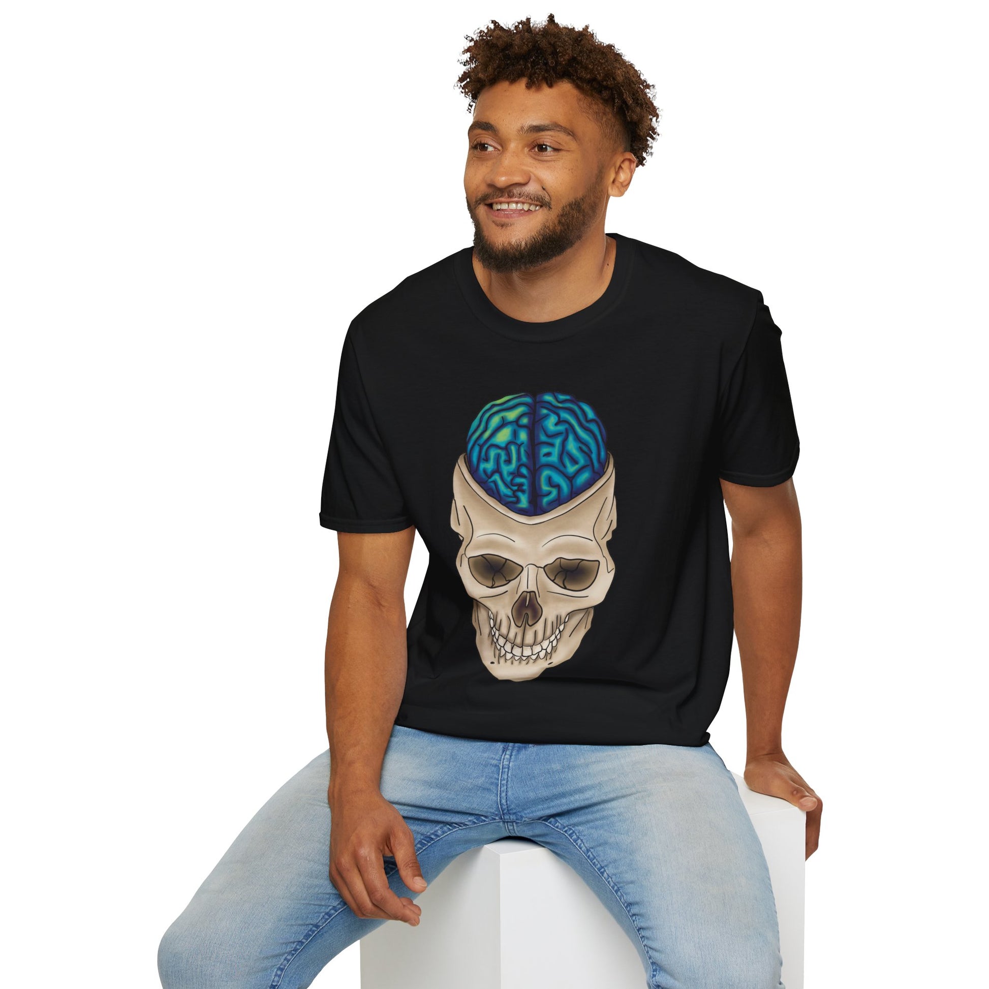 Man wearing a black t-shirt featuring a drawing of an anatomical skull, with a brain emerging from the top.