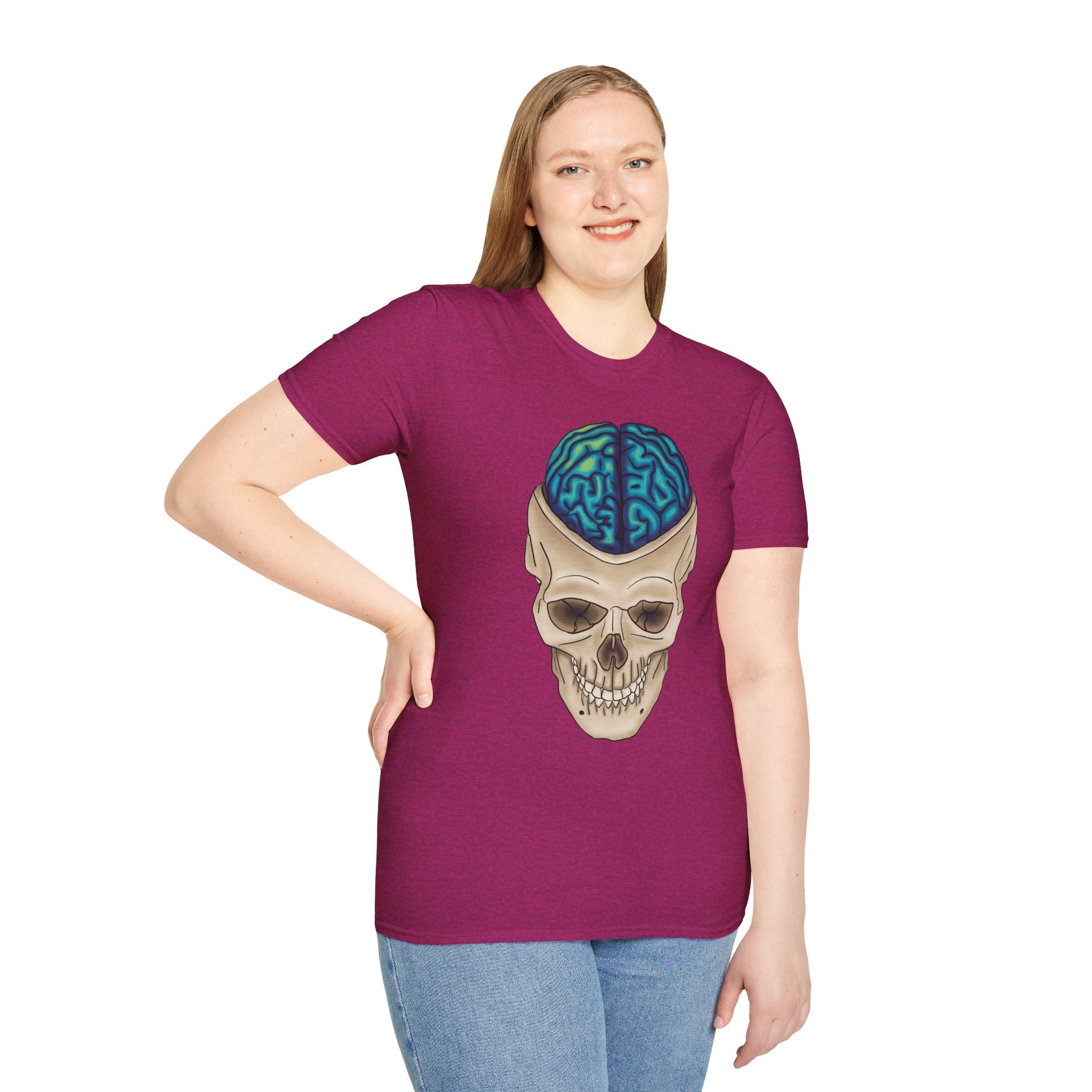 Woman wearing a fuscia t-shirt featuring a drawing of an anatomical skull, with a brain emerging from the top.