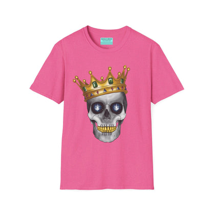 Pink t-shirt featuring an anatomical skull wearing an ornate crown, with gold teeth, large sapphire gemstones in the eye sockets, and emeralds and rubies decorating the crown.