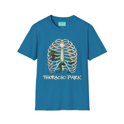 Light blue unisex short sleeve tee with a clever Jurassic twist—an anatomical rib cage doubles as a prehistoric prison for a tiny T-Rex, with the punny caption "Thoracic Park" below. It's dino-mite meets anatomy class in the best way possible.